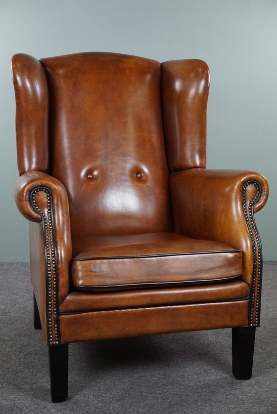 Image 1 of Grand fauteuil à oreilles en cuir de mouton