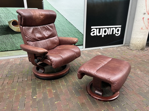 Stressless armchair with brown leather ottoman 