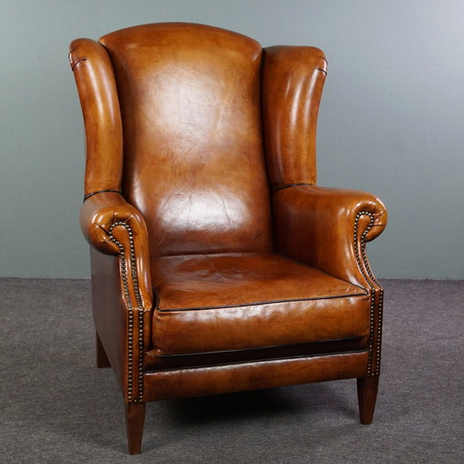 Sheep leather wing chair with black piping