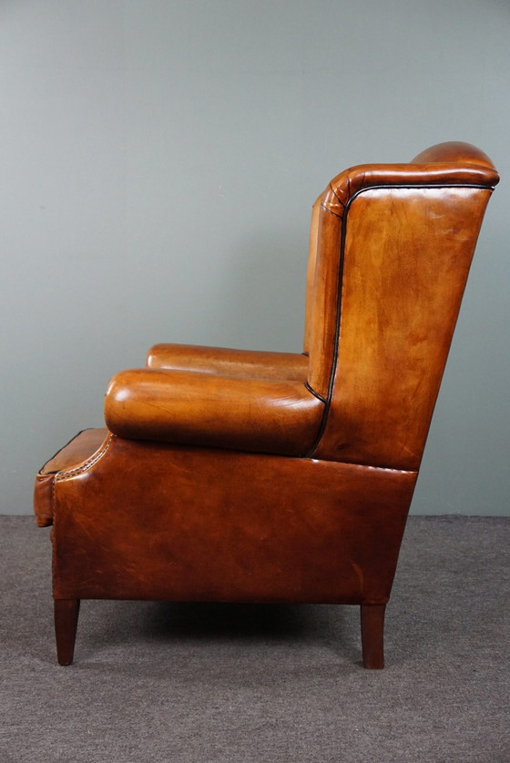 Image 1 of Sheep leather wing chair with black piping