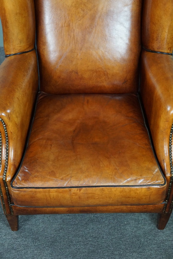 Image 1 of Sheep leather wing chair with black piping