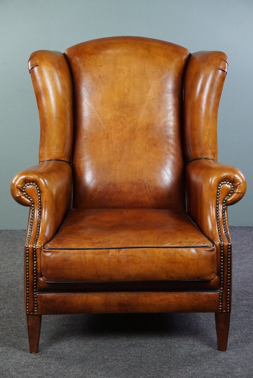 Sheep leather wing chair with black piping