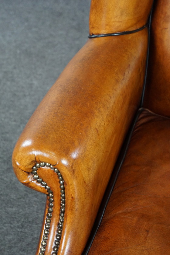 Image 1 of Sheep leather wing chair with black piping