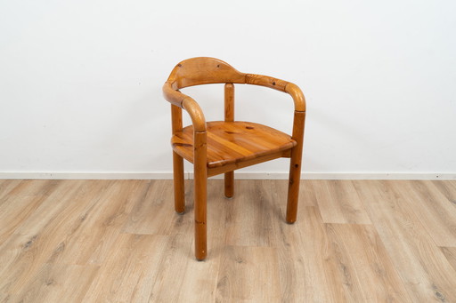 Wooden dining chair with armrests by Rainer Daumiller