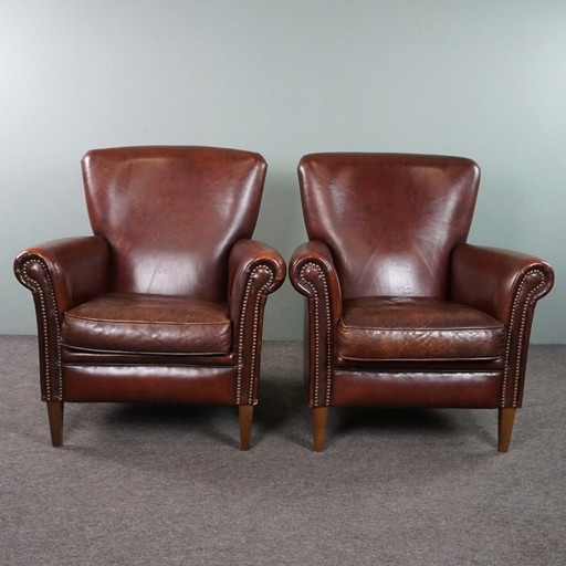 Set of two sheep leather armchairs/armchairs with high backs