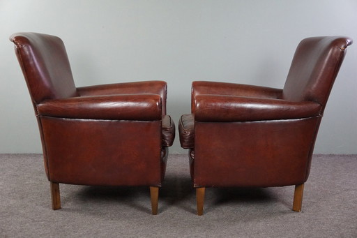 Set of two sheep leather armchairs/armchairs with high backs