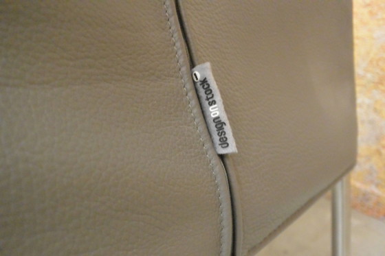 Image 1 of Gray leather Design on Stock Limec armchair