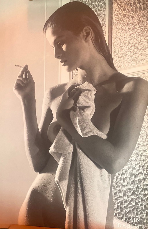 Alain Daussin: Female nude with a cigarette after the shower