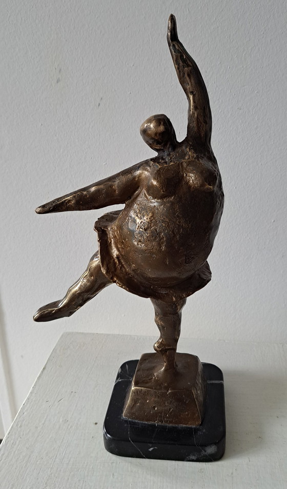 Image 1 of Cheerful dancing woman figurine