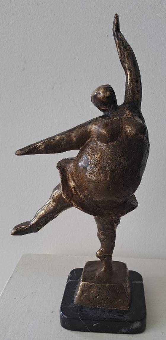 Image 1 of Cheerful dancing woman figurine