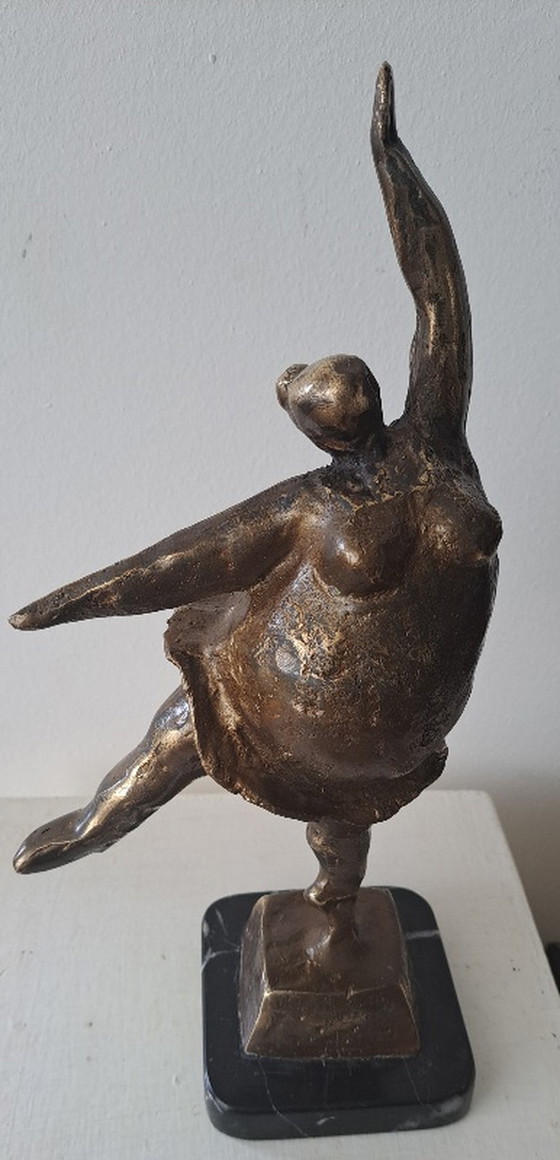 Image 1 of Cheerful dancing woman figurine