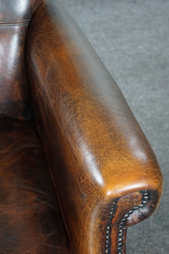 Image 1 of Stately sheep leather armchair, comfortable seat and high back