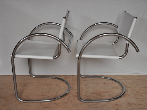 2x designer tubular frame chair