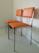 2x Vintage orange chairs
