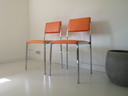 2x Vintage orange chairs