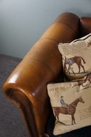 Spacious sheepskin 3-seater sofa with fabric cushions