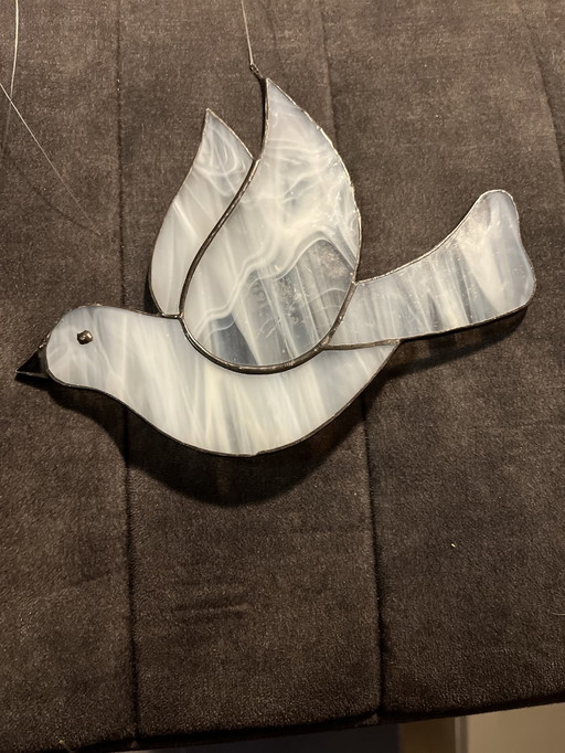 Dove of glass and lead