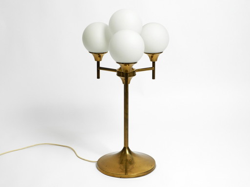 Beautiful large 1960s brass table or floor lamp with 4 glass spheres by Kaiser Leuchten