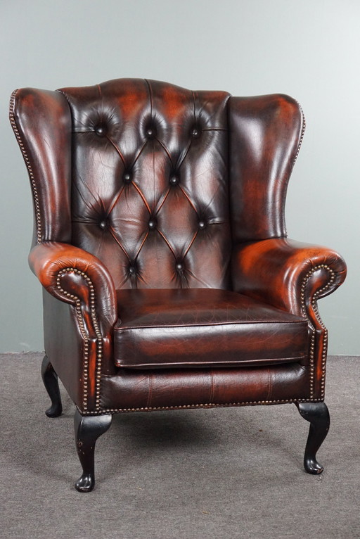 Cowhide Chesterfield wing armchair