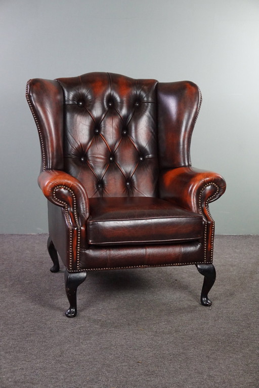 Cowhide Chesterfield wing armchair