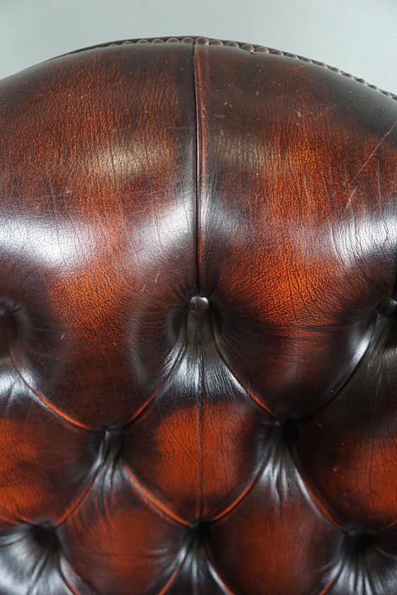 Image 1 of Cowhide Chesterfield wing armchair