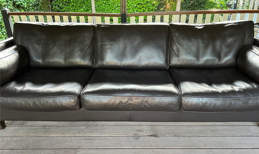 Black/ brown leather sofas