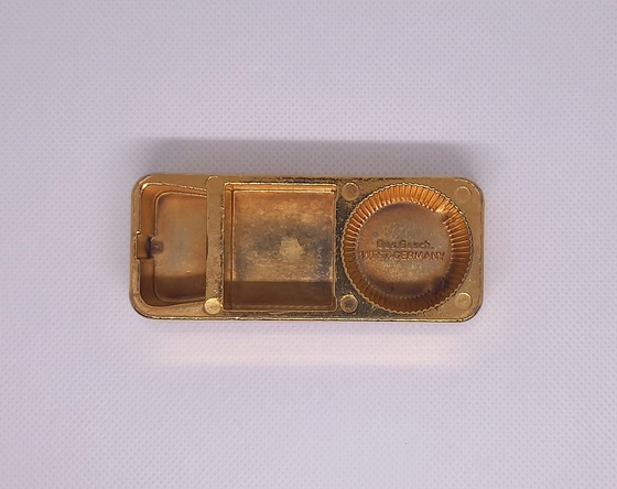 Image 1 of Gold bar looking bottle opener