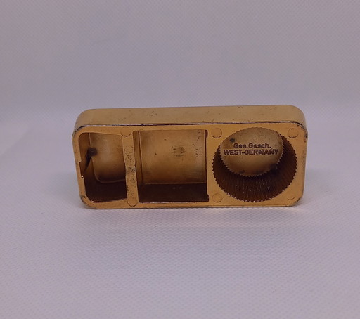 Gold bar looking bottle opener