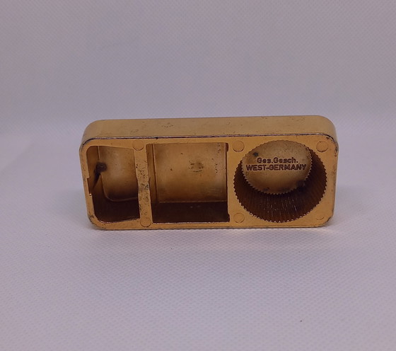 Image 1 of Gold bar looking bottle opener