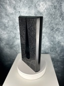 Escultura de lágrima negra
