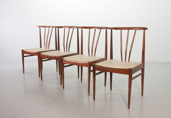 Image 1 of Skandinavisch eetkamerstoelen met spindelrug van massief palissander en karamelkleurige kunstleren bekleding. Set van vier, jare