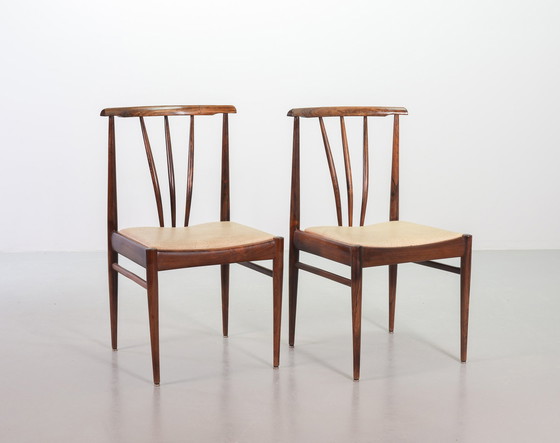 Image 1 of Scandinavian dining room chairs with spindle back made of solid rosewood and caramel-colored artificial leather upholstery. Set 