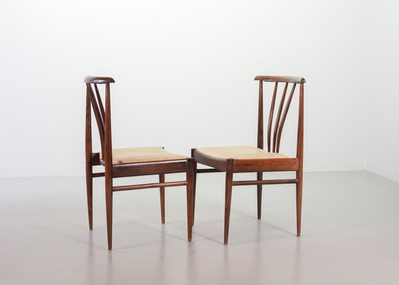 Image 1 of Scandinavian dining room chairs with spindle back made of solid rosewood and caramel-colored artificial leather upholstery. Set 