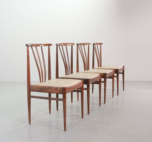 Scandinavian dining room chairs with spindle back made of solid rosewood and caramel-colored artificial leather upholstery. Set 