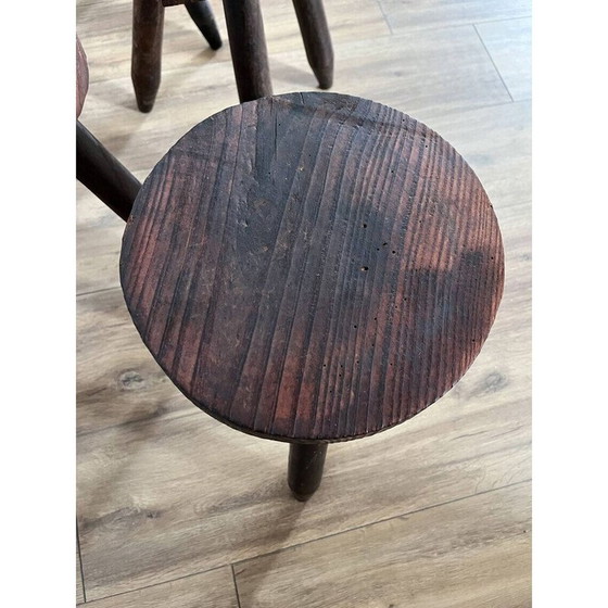 Image 1 of Ensemble de 4 tabourets tripodes vintage recouverts de peau de vache