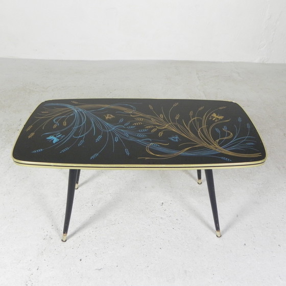 Image 1 of Table basse vintage avec plateau en verre et pieds angulaires, années 1950