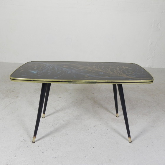 Image 1 of Table basse vintage avec plateau en verre et pieds angulaires, années 1950
