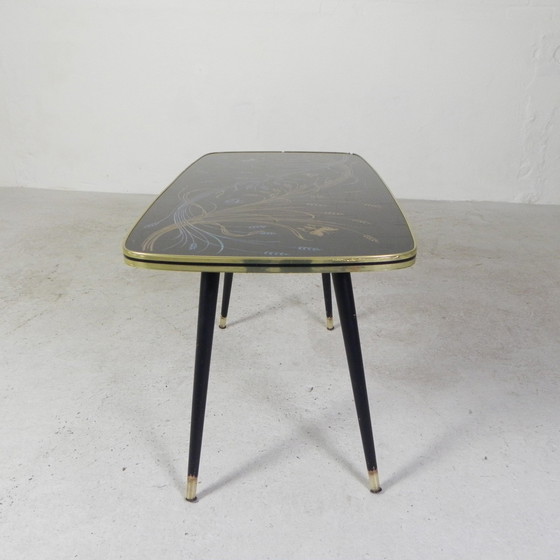 Image 1 of Table basse vintage avec plateau en verre et pieds angulaires, années 1950