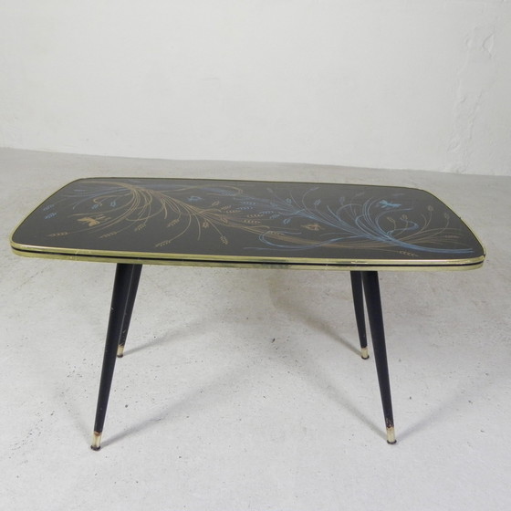 Image 1 of Table basse vintage avec plateau en verre et pieds angulaires, années 1950