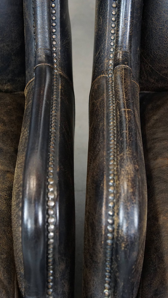 Image 1 of 2 X Fauteuil en cuir de boeuf noir avec dossier haut et clous décoratifs