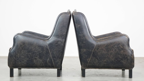 Image 1 of 2 X Fauteuil en cuir de boeuf noir avec dossier haut et clous décoratifs