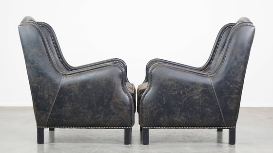 Image 1 of 2 X Fauteuil en cuir de boeuf noir avec dossier haut et clous décoratifs
