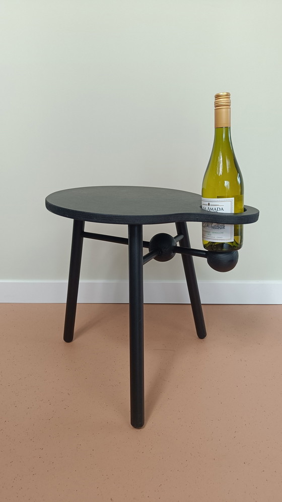 Image 1 of Table d'appoint design avec porte-bouteille