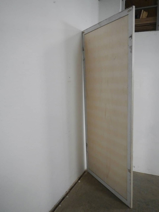 Image 1 of Miroir monté sur un cadre métrique 1980