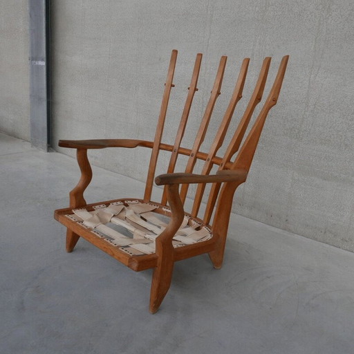 Fauteuil "Repos" en chêne du milieu du siècle par Guillerme et Chambron, France années 1960