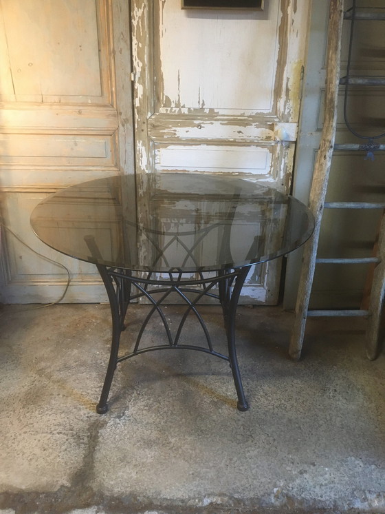 Image 1 of Table Ronde Pieds Métal Et Verre Fumée