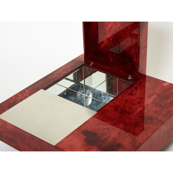 Image 1 of Table basse vintage en parchemin rouge et acier avec bar par Aldo Tura, Italie 1960