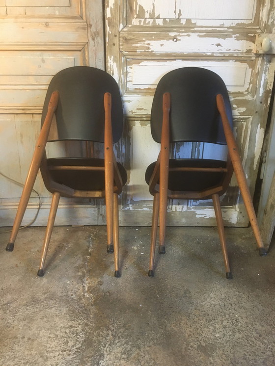 Image 1 of Paire de chaises Pegase vintage en hêtre et simili cuir par Baumann, 1960