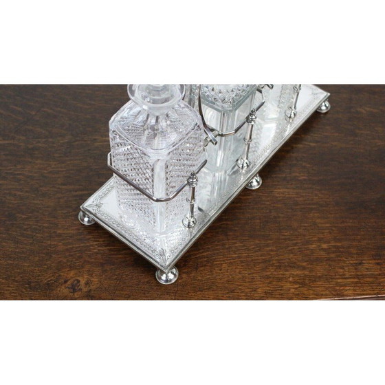 Image 1 of Vintage Victorian Silver Tantalus 3 Bottle Decanter Set