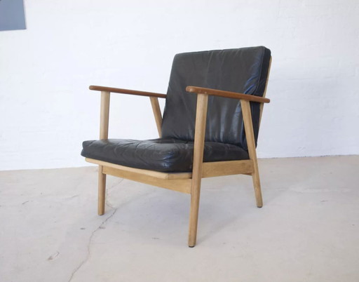 Fauteuil danois en teck et en chêne, années 1950.